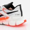 imageReebok Mens Floatzig 1 SneakerFtwwht Orgfla Cblack