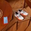 imageReebok Mens Floatzig 1 SneakerFtwwht Orgfla Cblack