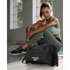 imageReebok Duffle Bag  Carry On Gym Bag for Workout and Travel Duffel Bags  Small Size Overnight Bags for Women and Men Size Small Aleph BlueAleph Black