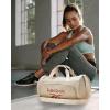 imageReebok Duffle Bag  Carry On Gym Bag for Workout and Travel Duffel Bags  Small Size Overnight Bags for Women and Men Size Small Aleph BlueEaston Beige