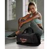 imageReebok Duffle Bag  Carry On Gym Bag for Workout and Travel Duffel Bags  Small Size Overnight Bags for Women and Men Size Small Aleph BlueEaston Black