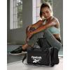 imageReebok Duffle Bag  Carry On Gym Bag for Workout and Travel Duffel Bags  Small Size Overnight Bags for Women and Men Size Small Aleph BlueWarrior II Black with Contrast Logo