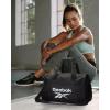 imageReebok Duffle Bag  Carry On Gym Bag for Workout and Travel Duffel Bags  Small Size Overnight Bags for Women and Men Size Small Aleph BlueWarrior II Black