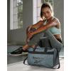 imageReebok Duffle Bag  Carry On Gym Bag for Workout and Travel Duffel Bags  Small Size Overnight Bags for Women and Men Size Small Aleph BlueWarrior II Light Grey