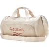 imageReebok Duffle Bag  Carry On Gym Bag for Workout and Travel Duffel Bags  Small Size Overnight Bags for Women and Men Size Small Aleph BlueEaston Beige