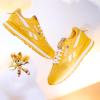 imageReebok UnisexChild Sonic Kids Classic Leather Step N Flash SneakerGoldWhiteGold