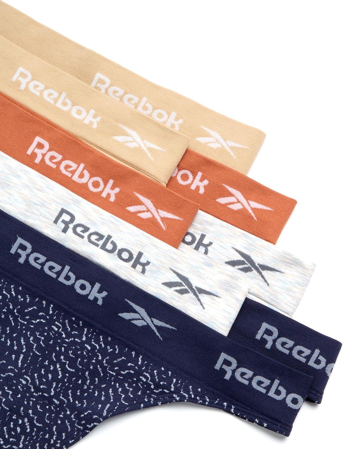 imageReebok Womens Thongs  8 Pack Performance Stretch GString Thongs for Women  Breathable No Show Sexy Lingerie UnderwearTanClayNatural SpacedyeEvening BlueJacquard