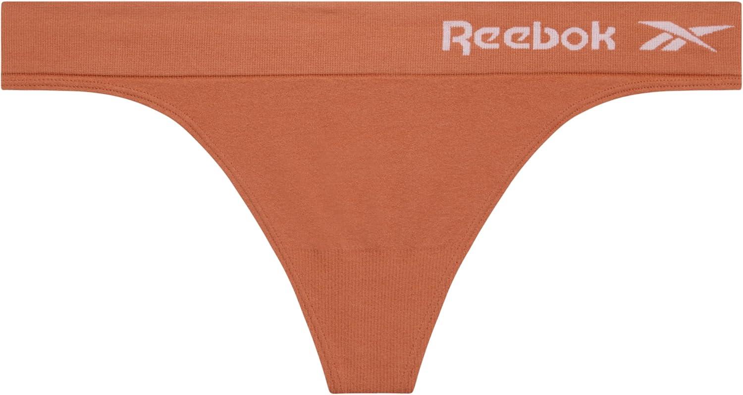 imageReebok Womens Thongs  8 Pack Performance Stretch GString Thongs for Women  Breathable No Show Sexy Lingerie UnderwearTanClayNatural SpacedyeEvening BlueJacquard