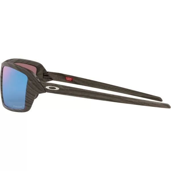 imageOakley Man Sunglasses Black Camo Frame Prizm Ruby Lenses 63MMWoodgrainPrizm Deep Water Polarized