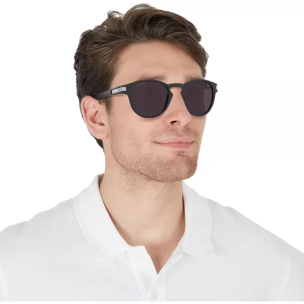 imageOakley Mens Oo9265 Latch Oval SunglassesMatte CarbonPrizm Grey