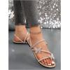 imageFloerns Womens Elegant Rhinestone Butterfly Transparent Elastic Strap Summer Flat SandalsApricot