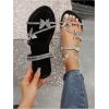 imageFloerns Womens Elegant Rhinestone Butterfly Transparent Elastic Strap Summer Flat SandalsBlack