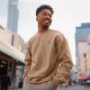 imageDALIX Astronaut Embroidery Relaxed Crewneck Sweatshirt Soft Fleece Fit Lounge MensCamel